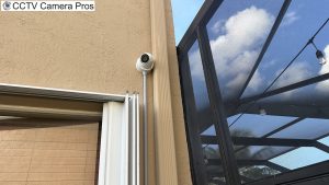security camera installation with junction box and wire conduit